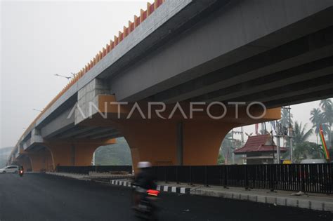 Galeri foto JUAL AKUN BRAZZER lewat jembatan layang musim hujan di di dashboard akun pengguna